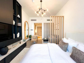 Modern Studio in JVC - Pool, Gym & BBQ Access